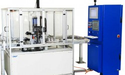 Рис. 4: Интегрированный в линию стенд для измерения уровня шума подшипников ступичных узлов